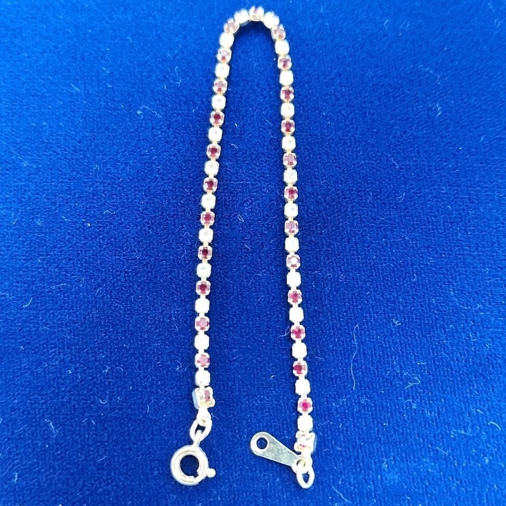 Vintage Avon Gold Plated Red Rhinestone Tennis Bracelet